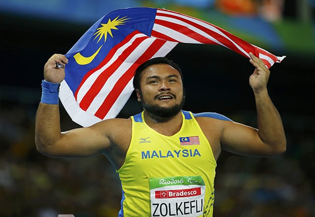 2016 Rio Paralympics - Men's Shot Put - F20 Final - Olympic Stadium - Rio de Janeiro, Brazil - 10/09/2016. Ziyad Zolkefli Muhammad of Malaysia celebrates winning the gold medal in the event. REUTERS/Ricardo Moraes FOR EDITORIAL USE ONLY. NOT FOR SALE FOR MARKETING OR ADVERTISING CAMPAIGNS.