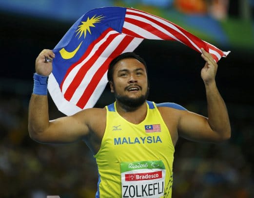 2016 Rio Paralympics - Men's Shot Put - F20 Final - Olympic Stadium - Rio de Janeiro, Brazil - 10/09/2016. Ziyad Zolkefli Muhammad of Malaysia celebrates winning the gold medal in the event. REUTERS/Ricardo Moraes FOR EDITORIAL USE ONLY. NOT FOR SALE FOR MARKETING OR ADVERTISING CAMPAIGNS.