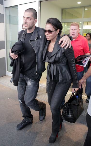 20.MAY.2011 - VIENNA - AUSTRIA US SINGER JANET JACKSON AND BOYFRIEND WISSAM AL MANA SEEN ARRIVING AT VIENNA INTERNATIONAL AIRPORT. BYLINE MUST READ : XPOSUREPHOTOS.COM *AVAILABLE FOR UK SALE ONLY* *UK CLIENTS MUST CALL PRIOR TO TV OR ONLINE USAGE PLEASE TELEPHONE 020 7377 2770 & +1 310 600 4723*