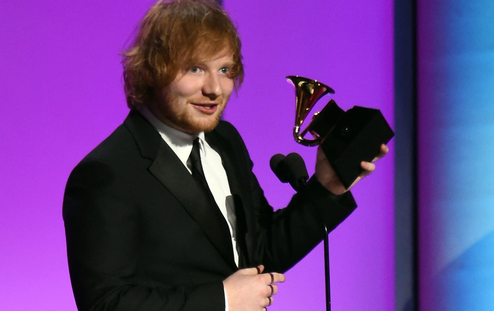 Feb 15, 2016; Los Angeles, CA, USA; Ed Sheeran accepts for Thinking Out Loud in Best Pop Solo Performance during the 58th Grammy Awards at the Staples Center. Mandatory Credit: Robert Hanashiro-USA TODAY NETWORK *** Please Use Credit from Credit Field ***