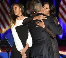 Michelle Obama (R-L) hugs her husband U.S. President Barack Obama as they stand on stage with daughter Malia after the President delivered his farewell address to a crowd of supporters at McCormick Place in Chicago on January 10, 2017. Photo by David Banks/UPI Photo via Newscom