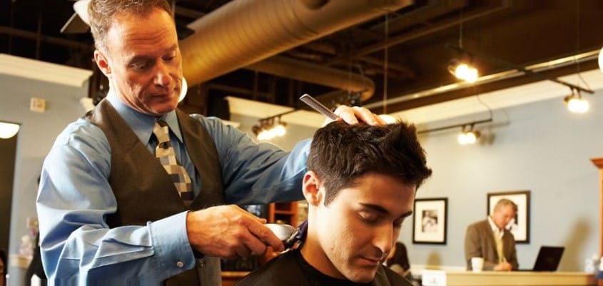 barber-cutting-mans-hair